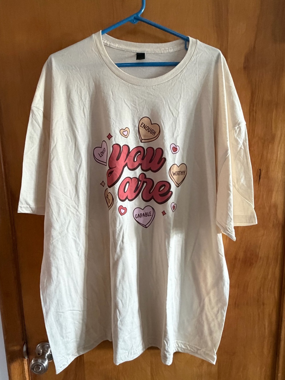Custom made by Essential Tees Gildan Cream Tee with Pink 'you are' Heart Graphic
